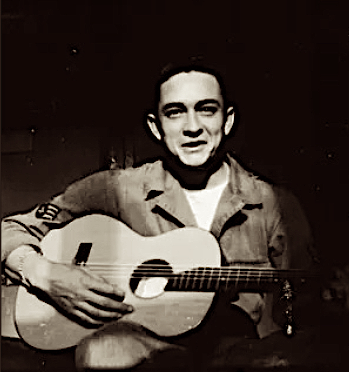 Picture of Johnny Cash with guitar, while stationed in Germany in 1953.