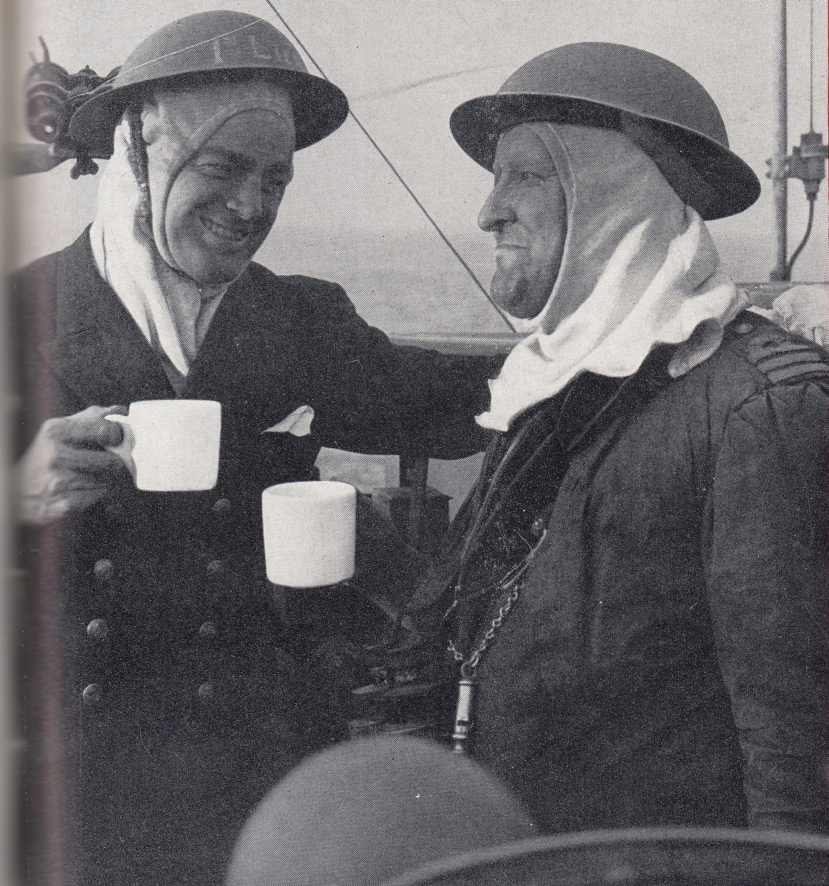 Lieutenant Commander Coughlin shares a cup of tea with his captain, Commander James “Jimmy” Hibbard.